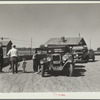 Part of the daily motorcade of drought refugees. The Montana-North Dakota state line