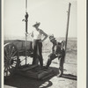 Fixing a dried well on the farm of Mrs. Emma Knoll. Grant County, North Dakota