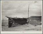 Dugout inhabited by farmers who have abandoned their farms and moved to town. Grassy Butte, North Dakota