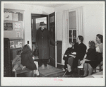 Doctor Tabor entering health center to give inoculations against measles to a group of children. [Dailey,] West Virginia