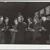 Group singing hymns at the opening of the Sunday school. While there are no churches on the project there are five or six in the area close by. This one is just off the project and is attended by many project members. Dailey, West Virginia