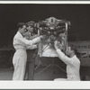 Students working on airplane motor at civilian pilot training school. Meacham Field, Fort Worth, Texas