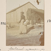 Colored woman in Camp Witherill, S.C. gathering soldiers' washings