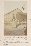 Colored woman in Camp Witherill, S.C. gathering soldiers' washings
