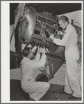 Fort Worth, Texas. Meacham Field. Students repairing plane motor