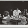 Members of mother's committee serve lunch at nursery school. FSA (Farm Security Administration) camp. Robstown, Texas