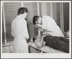 Doctor examining patient. Robstown FSA (Farm Security Administration) camp, Texas