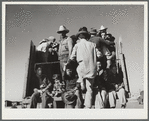 Migratory workers returning from day's work. Robstown FSA (Farm Security Administration) camp, Texas