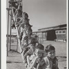 Nursery school children in playground. Robstown camp, Texas