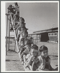 Nursery school children in playground. Robstown camp, Texas