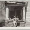 John Miller and family who live in the old Pettway Mansion. Gees Bend [i.e. Boykin], Alabama
