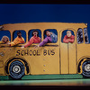 Kristen Chenoweth, Stanley Wayne Mathis, Ilana Levine, B. D. Wong and Anthony Rapp in bus from a scene from the stage production You're a Good Man Charlie Brown