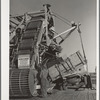 Machine for piling sugar beets at railroad. Adams County, Colorado