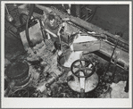 Loading diffusion chamber with sugar beet pulp in factory at Brighton, Colorado