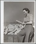 Mary Ellen Clarke with hybrid seed corn. Grundy County, Iowa