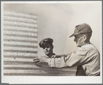 Erecting a metal bin for corn storage under ever-normal granary plan. Grundy County, Iowa