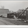 Farmer erects a new corn crib during harvest. Grundy Center, Iowa