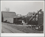 Farmer erects a new corn crib during harvest. Grundy Center, Iowa