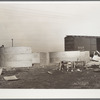 Erecting bins for corn storage under ever-normal granary plan. Marshall County, Iowa