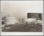 Erecting bins for corn storage under ever-normal granary plan. Marshall County, Iowa