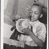 Harlem Community Art Center: student in metal craft class, 290 Lenox Avenue