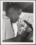Harlem Community Art Center: student in metal craft class, 290 Lenox Avenue