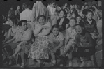 Woman and children [long shot] in audience during stage production Taming of the Shrew, East River Park Amphitheater