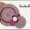 Postcard announcing "Xenobia Bailey: Paradise Under Reconstruction in the Aesthetic of Funk" at Rush Arts Gallery