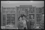 Staff members Genevieve Oswald, Miriam Gross, Leroy Fentress, and Jacqueline Maskey in the Dance Collection of the New York Public Library