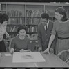 Staff members Miriam Gross, Genevieve Oswald, Leroy Fentress, and Jacqueline Maskey in the Dance Collection of the New York Public Library