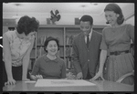Staff members Miriam Gross, Genevieve Oswald, Leroy Fentress, and Jacqueline Maskey in the Dance Collection of the New York Public Library