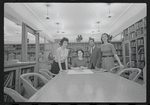 Staff members Miriam Gross, Genevieve Oswald, Leroy Fentress, and Jacqueline Maskey in the Dance Collection of the New York Public Library