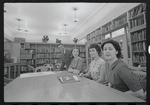 Staff members Leroy Fentress, Jacqueline Maskey, Miriam Gross, and Genevieve Oswald in the Dance Collection of the New York Public Library