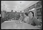 Staff members Leroy Fentress, Jacqueline Maskey, Miriam Gross, and Genevieve Oswald in the Dance Collection of the New York Public Library
