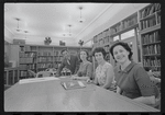 Staff members Leroy Fentress, Jacqueline Maskey, Miriam Gross, and Genevieve Oswald in the Dance Collection of the New York Public Library