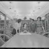 Staff members Miriam Gross, Genevieve Oswald, Leroy Fentress, and Jacqueline Maskey in the Dance Collection of the New York Public Library