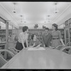 Staff members Miriam Gross, Genevieve Oswald, Leroy Fentress, and Jacqueline Maskey in the Dance Collection of the New York Public Library