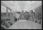 Staff members Miriam Gross, Genevieve Oswald, Leroy Fentress, and Jacqueline Maskey in the Dance Collection of the New York Public Library