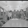 Staff members Miriam Gross, Genevieve Oswald, Leroy Fentress, and Jacqueline Maskey in the Dance Collection of the New York Public Library