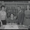 Staff members Miriam Gross, Genevieve Oswald, Leroy Fentress, and Jacqueline Maskey in the Dance Collection of the New York Public Library