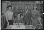 Staff members Miriam Gross, Genevieve Oswald, Leroy Fentress, and Jacqueline Maskey in the Dance Collection of the New York Public Library