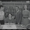 Staff members Miriam Gross, Genevieve Oswald, Leroy Fentress, and Jacqueline Maskey in the Dance Collection of the New York Public Library