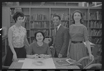Staff members Miriam Gross, Genevieve Oswald, Leroy Fentress, and Jacqueline Maskey in the Dance Collection of the New York Public Library