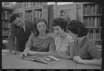 Staff members Miriam Gross, Genevieve Oswald, Leroy Fentress, and Jacqueline Maskey in the Dance Collection of the New York Public Library
