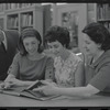 Staff members Miriam Gross, Genevieve Oswald, Leroy Fentress, and Jacqueline Maskey in the Dance Collection of the New York Public Library