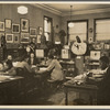 Reading room of the Schomburg Collection at the 135th Street Branch Library. Lawrence Reddick, curator, seated at right
