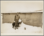 William Gurderman in front of barn on his submarginal farm. Jefferson County, New York