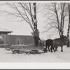 Farmer in sled. Oswego County, New York