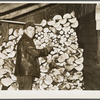 George Deacon in his woodshed. Oswego County, New York