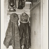 Clothes and lanterns in the farm home of Fred Ess. Near Dalton, New York